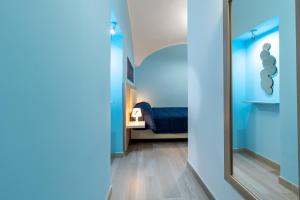 A bed or beds in a room at Bianco Latte