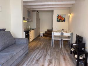 a living room with a couch and a table at Lagos Center House in Lagos