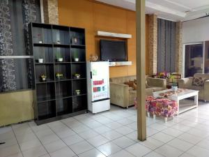 Kuchyň nebo kuchyňský kout v ubytování Hotel Nirwana Ternate RedPartner
