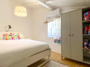 Postel nebo postele na pokoji v ubytování Casa dos chocalhos-Piscina-Perto Praia Fluvial-Vista incrível e sossego