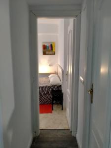 Posteľ alebo postele v izbe v ubytovaní Apartamento a 5min a pie de la playa de El Palo