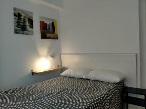 Posteľ alebo postele v izbe v ubytovaní Apartamento a 5min a pie de la playa de El Palo