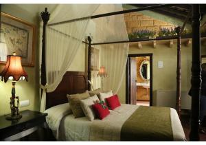 Posteľ alebo postele v izbe v ubytovaní La Casona de Calderón Gastronomic & Boutique Hotel