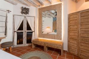 Postel nebo postele na pokoji v ubytování Holbox Dream Beachfront Hotel