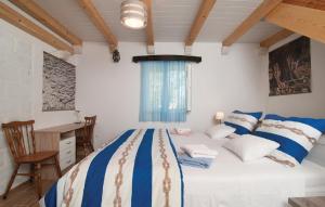 Postel nebo postele na pokoji v ubytování Holiday home Glavica + 27 fotografií