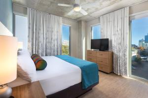 Postel nebo postele na pokoji v ubytování Club Wyndham Austin