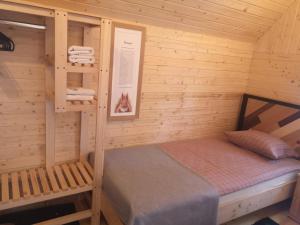 Postel nebo postele na pokoji v ubytování Apartments&Camping ZIP