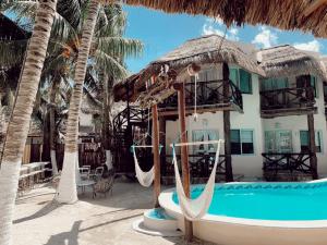 Bazén v ubytování Holbox Dream Beachfront Hotel nebo v jeho okolí