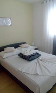 Postel nebo postele na pokoji v ubytování Apartman Grlić Obiteljski odmor