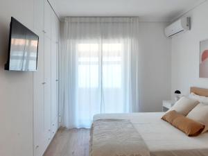 Posteľ alebo postele v izbe v ubytovaní PAPPA casa vacanze