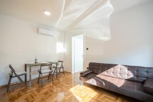 Posedenie v ubytovaní Apartman Grand + 8 fotografií