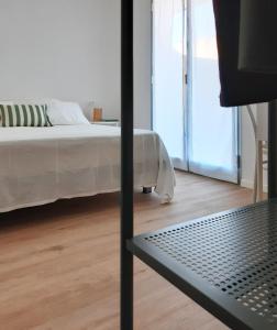 Posteľ alebo postele v izbe v ubytovaní PAPPA casa vacanze