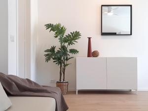 Televízia a/alebo spoločenská miestnosť v ubytovaní PAPPA casa vacanze