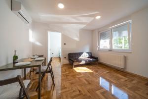 Posedenie v ubytovaní Apartman Grand