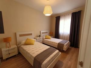 Posteľ alebo postele v izbe v ubytovaní El Mirador de Oter