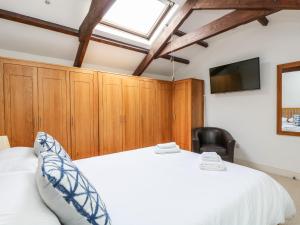 Voodi või voodid majutusasutuse Forge Cottage toas