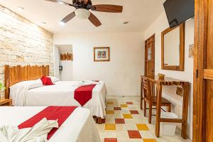 Ein Bett oder Betten in einem Zimmer der Unterkunft Hotel Boutique Casa Hipil