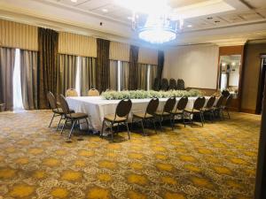 The business area and/or conference room at Hotel Executive Suites