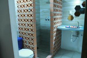 Ванная комната в Hotel Tres Piedras