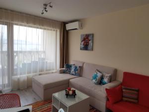 A seating area at By the Waves luxury beach apartment