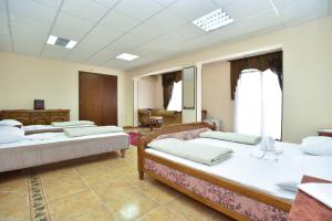 Postel nebo postele na pokoji v ubytování Hotel Grbalj