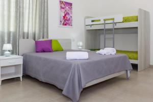 Postel nebo postele na pokoji v ubytování Paloma B&B