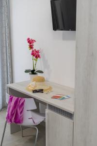 TV a/nebo společenská místnost v ubytování Paloma B&B