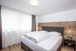 Postel nebo postele na pokoji v ubytování APART GRIES