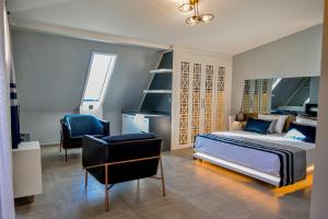 Postel nebo postele na pokoji v ubytování Sette Serenity Hotel