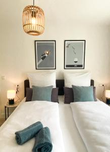 Ένα ή περισσότερα κρεβάτια σε δωμάτιο στο Haus Mosel Tales in Cochem für bis zu 9 Personen