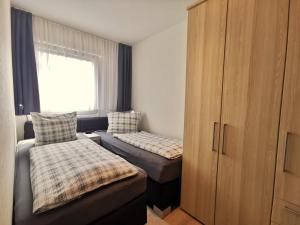 Postel nebo postele na pokoji v ubytování Sandbank