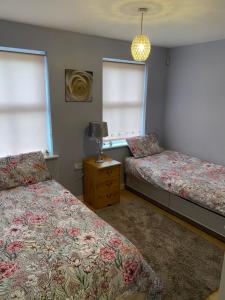 Ένα ή περισσότερα κρεβάτια σε δωμάτιο στο Bambz Apartment 3