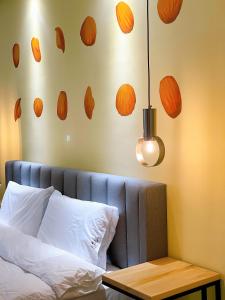 A bed or beds in a room at Sugar Island Inn