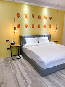 A bed or beds in a room at Sugar Island Inn