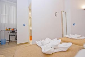 Posteľ alebo postele v izbe v ubytovaní Barcelona City Hotel