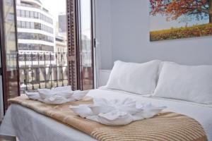 Posteľ alebo postele v izbe v ubytovaní Barcelona City Hotel