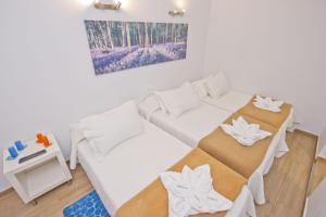 Posteľ alebo postele v izbe v ubytovaní Barcelona City Hotel