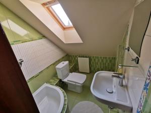 Kúpeľňa v ubytovaní Galery Apartman + 3 fotografie