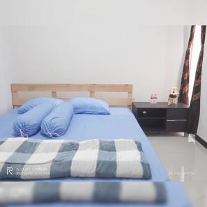 Ein Bett oder Betten in einem Zimmer der Unterkunft Villa Oth