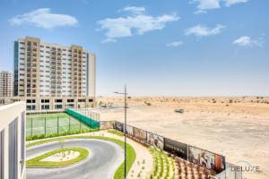 Gallery image of Welcoming 1BR in Town Square UNA Dubailand by Deluxe Holiday Homes in Dubai