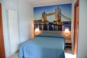 Postel nebo postele na pokoji v ubytování B&B Europa