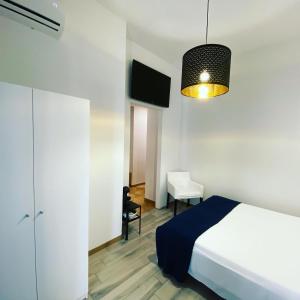 A bed or beds in a room at Le Camere di Rosanna Még 37 kép