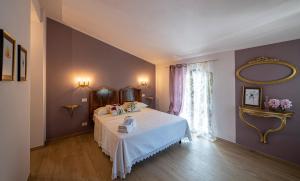 A bed or beds in a room at Agriturismo dalla Mimmi