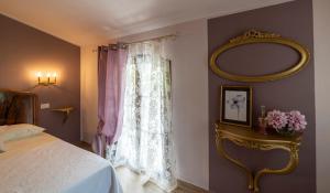 A bed or beds in a room at Agriturismo dalla Mimmi