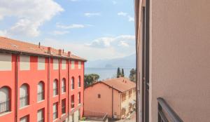 a view from a window of a city with buildings at Mimosa 24 in Acquaseria
