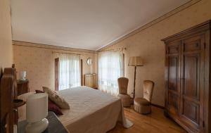 Postel nebo postele na pokoji v ubytování Agriturismo dalla Mimmi