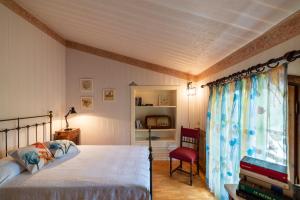 A bed or beds in a room at Agriturismo dalla Mimmi