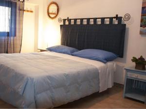 Katil atau katil-katil dalam bilik di Bed And Breakfast Maria