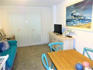 Televízia a/alebo spoločenská miestnosť v ubytovaní Torre Irta Family Complex LEK