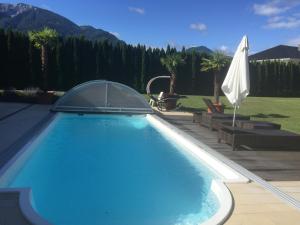 La alberca dentro o cerca de V Gemütliches Gartenhaus